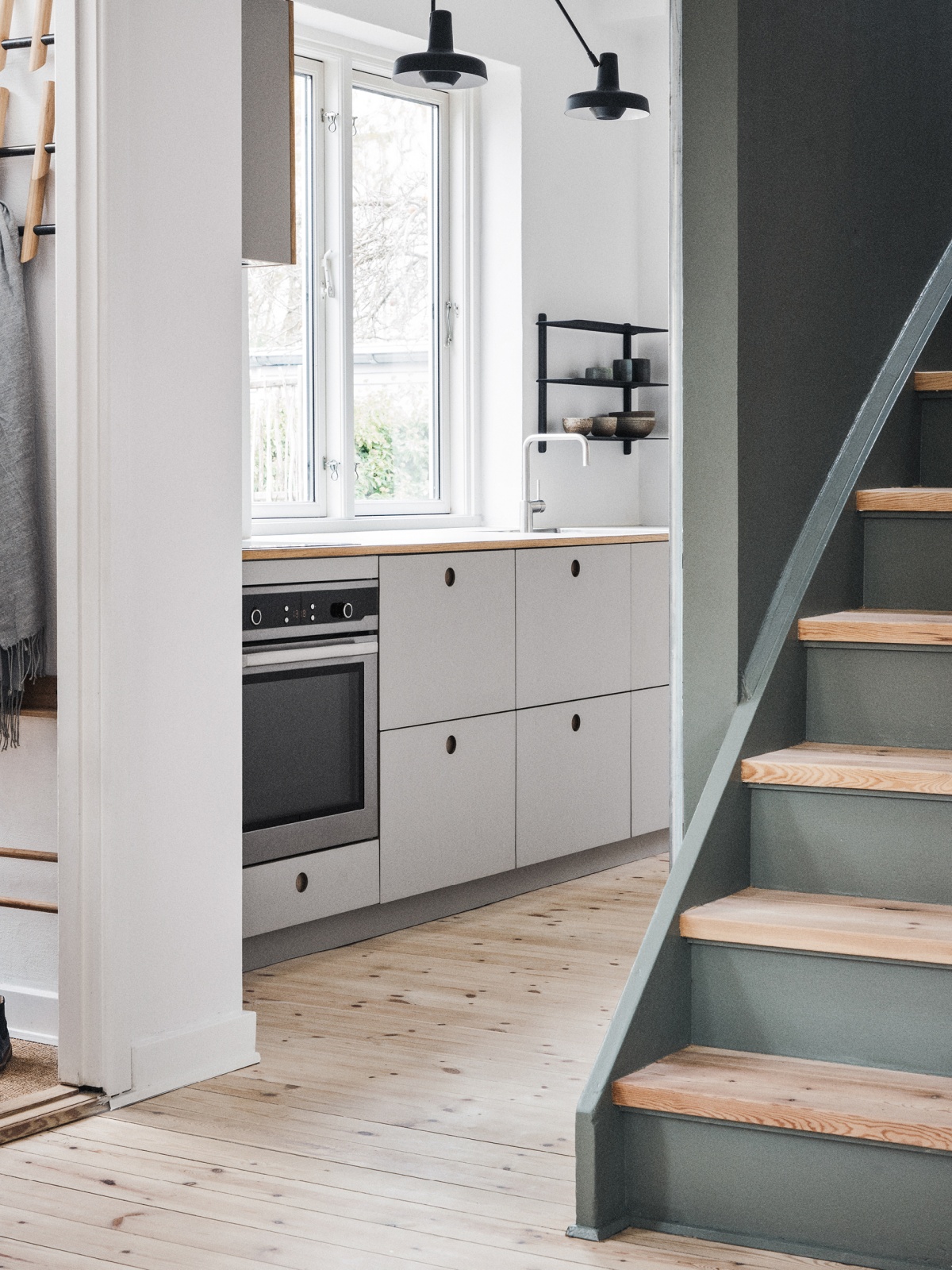 White kitchen and green wardrobe with BASIS fronts