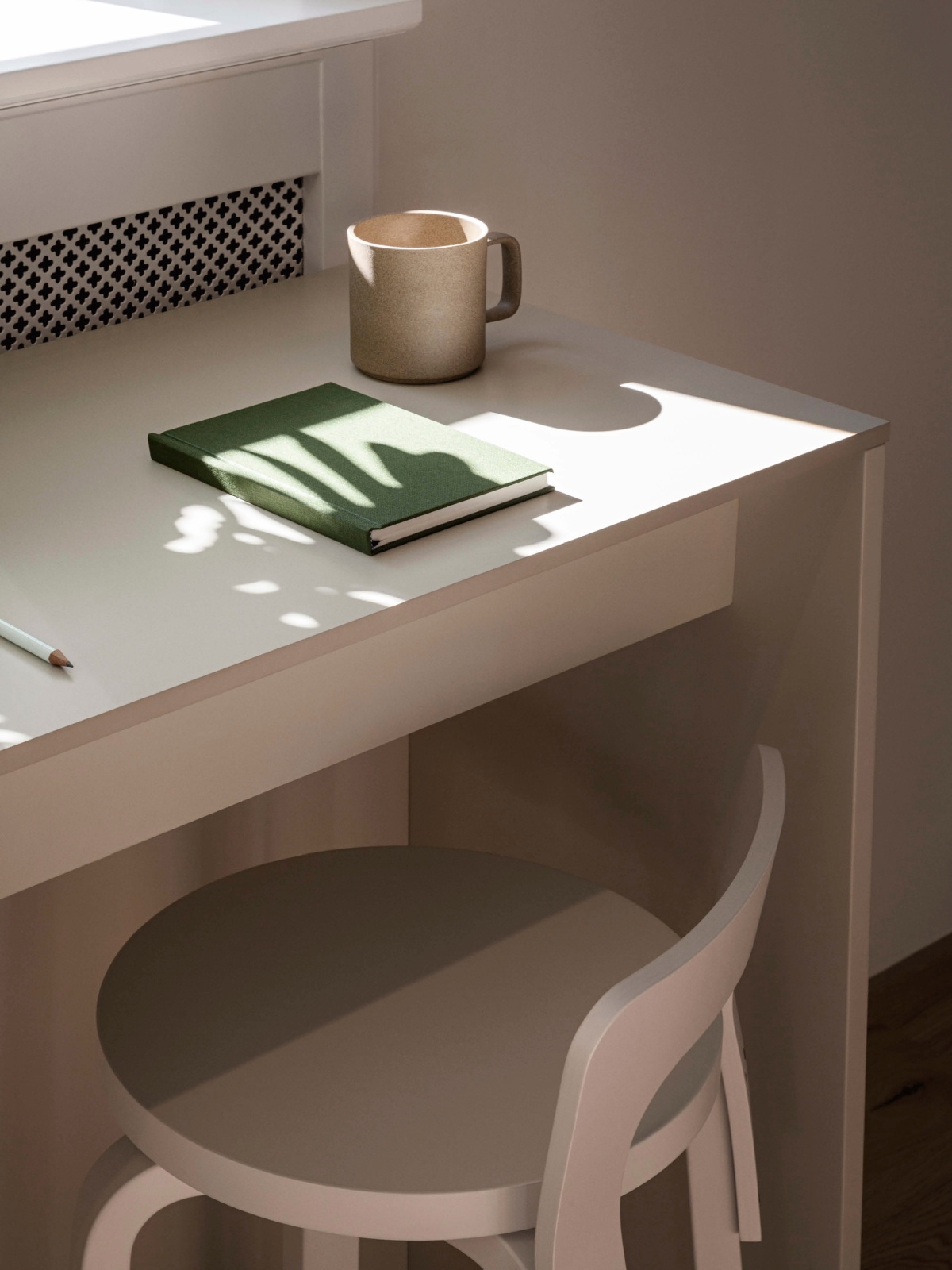 Green book on white table