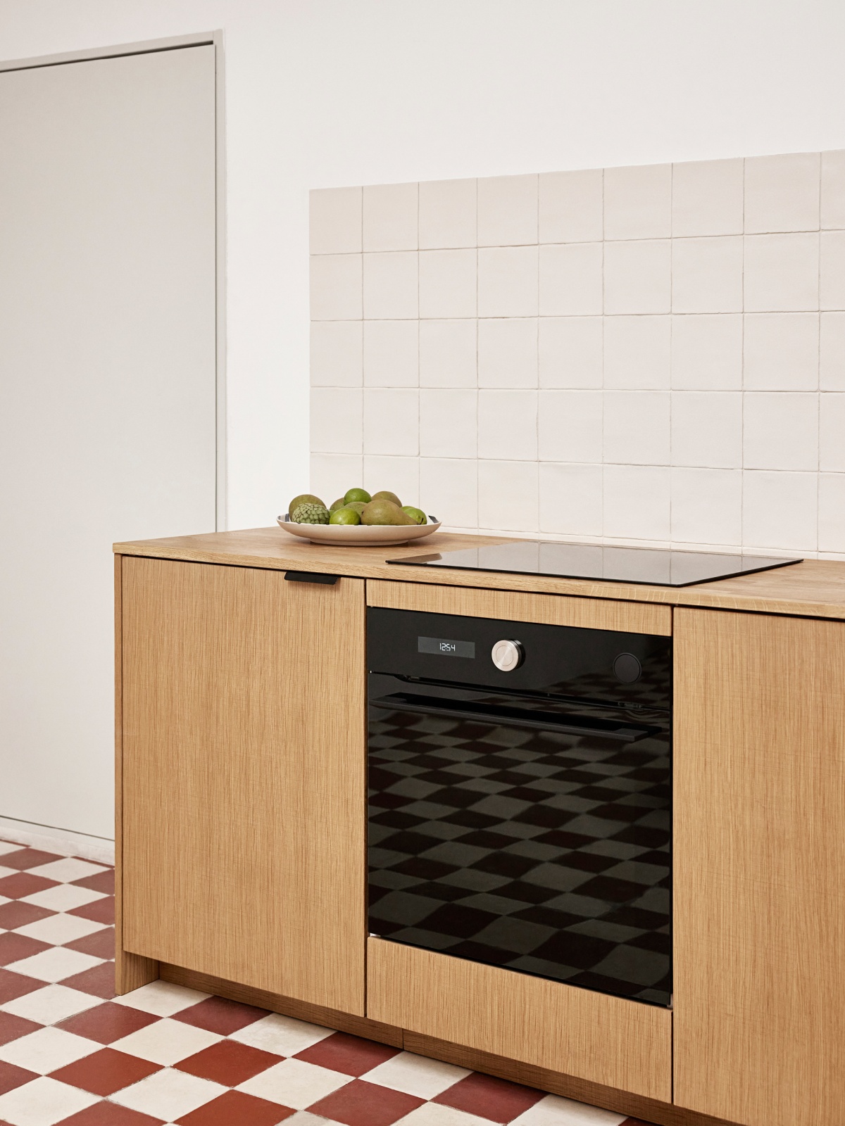 Wooden kitchen with built-in oven