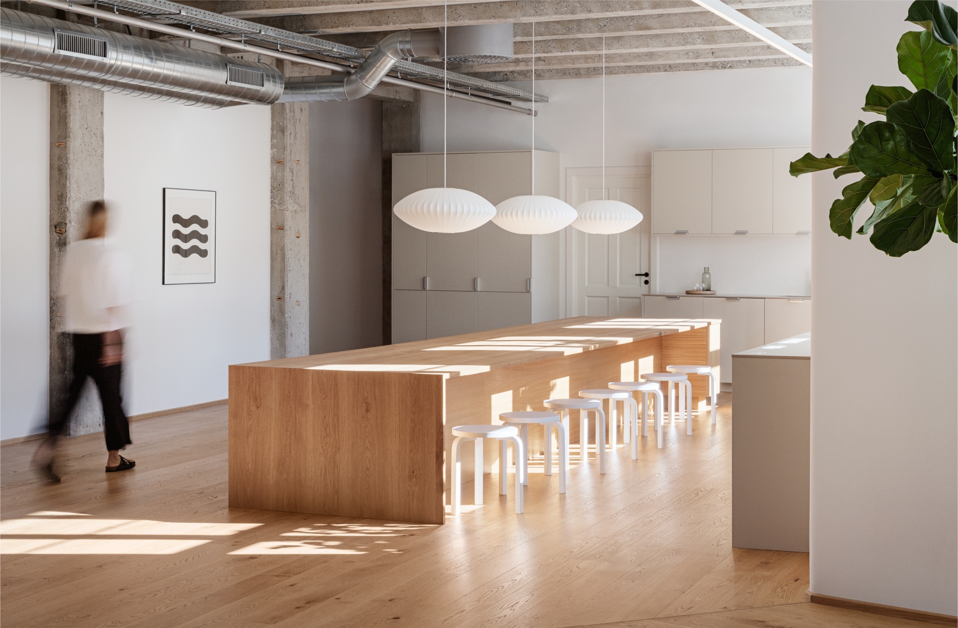 Light wooden table and white stools